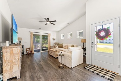 Situated in the Towns at Heather Glen community, this light and - photo 6