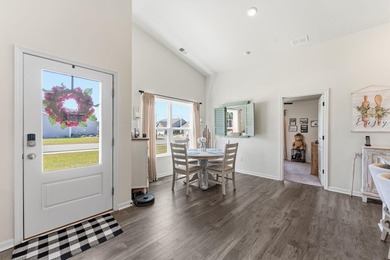 Situated in the Towns at Heather Glen community, this light and - photo 8