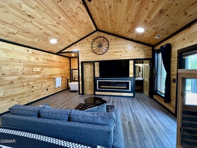 Newly completed in 2026, this stunning contemporary cabin offers - photo 29