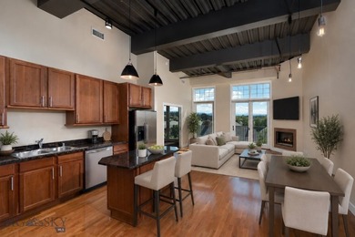 Perched on the fourth floor of Village Downtown, this - photo 2