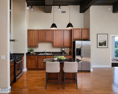 Perched on the fourth floor of Village Downtown, this - photo 5