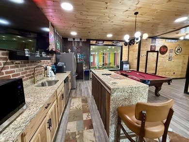 Newly completed in 2026, this stunning contemporary cabin offers - photo 49