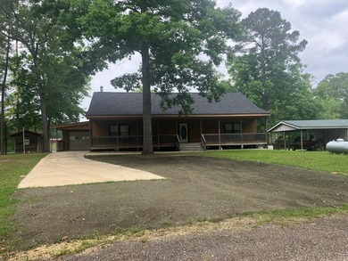 Big, two story, lakefront home with 6 bedrooms and 4.5 baths - photo 1