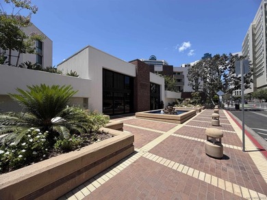 This top-floor sun-filled condo located in the center of the - photo 3