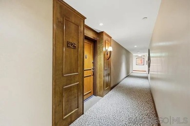 This top-floor sun-filled condo located in the center of the - photo 4