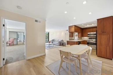 This top-floor sun-filled condo located in the center of the - photo 6