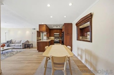 This top-floor sun-filled condo located in the center of the - photo 9