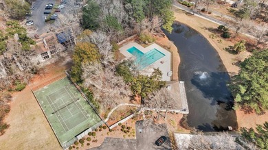 This first floor condo in a gated community with tons of - photo 4