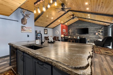 This stunning 3-bedroom, 2-bathroom lakefront retreat is the - photo 2