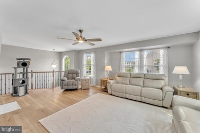 Welcome to this beautifully maintained end-unit townhome in the - photo 4