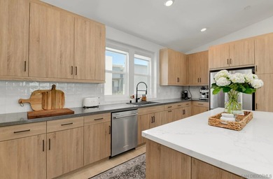 This stunning Dorsey Plan 3 showcases single-level *penthouse* - photo 8