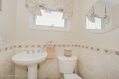 Welcome to 51 Petersons Lane! This legal 2 family side hall - photo 13