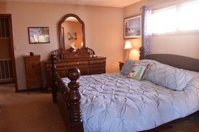 Enjoy lakeside living in this 3-bedroom, 2.5-bathroom brick home - photo 16