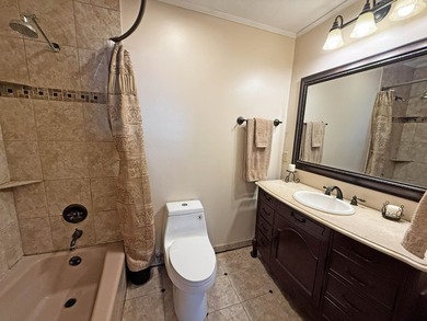 Enjoy lakeside living in this 3-bedroom, 2.5-bathroom brick home - photo 17