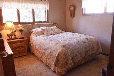 Enjoy lakeside living in this 3-bedroom, 2.5-bathroom brick home - photo 18