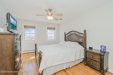 Welcome to 51 Petersons Lane! This legal 2 family side hall - photo 18