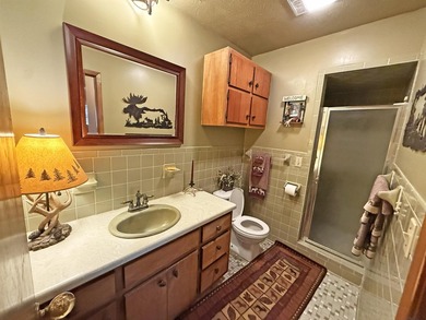 Enjoy lakeside living in this 3-bedroom, 2.5-bathroom brick home - photo 21