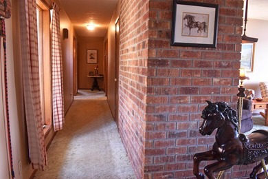 Enjoy lakeside living in this 3-bedroom, 2.5-bathroom brick home - photo 23