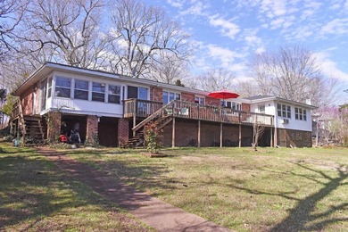 Enjoy lakeside living in this 3-bedroom, 2.5-bathroom brick home - photo 33