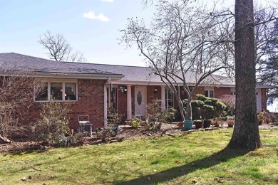 Enjoy lakeside living in this 3-bedroom, 2.5-bathroom brick home - photo 34