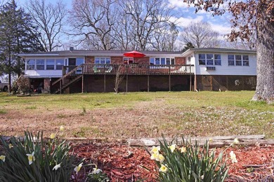 Enjoy lakeside living in this 3-bedroom, 2.5-bathroom brick home - photo 35