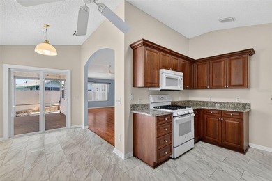 BOND PAID!! NO CARPET in This 3BR, 2BA ANNA MARIA COURTYARD - photo 10