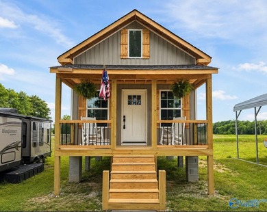 Charming Tiny Home in The Landings at Waterhouse Campground with - photo 1