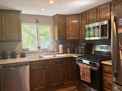Completely remodeled and move-in ready, this quaint home blends - photo 21
