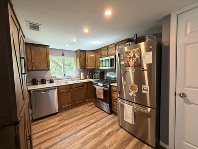 Completely remodeled and move-in ready, this quaint home blends - photo 23