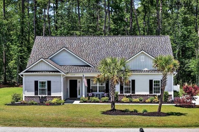 Experience refined Lowcountry living in Wedgefield Plantation at - photo 1