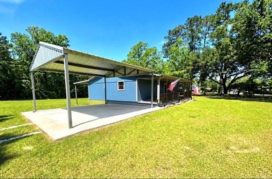 Charming 2-bedroom, 2-bath home on 1.55 unrestricted acres near - photo 2