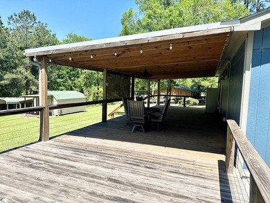 Charming 2-bedroom, 2-bath home on 1.55 unrestricted acres near - photo 3