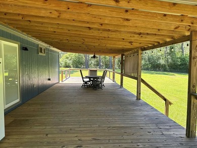 Charming 2-bedroom, 2-bath home on 1.55 unrestricted acres near - photo 4