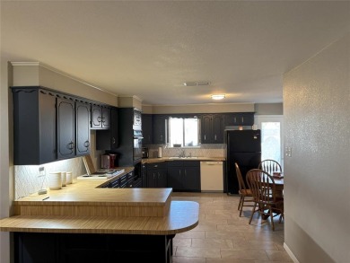 Price Improvement! Four Bedroom  2.5 bath on oversized corner