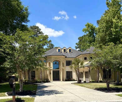 Welcome to 400 Chamberlin Road! This custom waterway home offers - photo 1