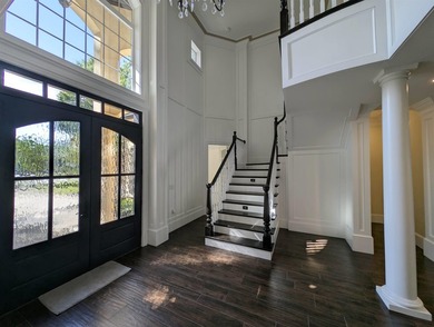 Welcome to 400 Chamberlin Road! This custom waterway home offers - photo 4