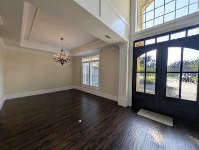Welcome to 400 Chamberlin Road! This custom waterway home offers - photo 5