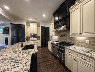 Welcome to 400 Chamberlin Road! This custom waterway home offers - photo 10