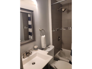 Fully furnished two-bedroom one block from the boardwalk. If you