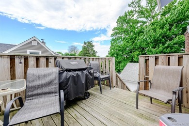 Bellmore legal 2-family home offers incredible versatility for - photo 2