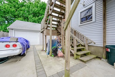 Bellmore legal 2-family home offers incredible versatility for - photo 3