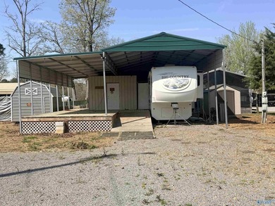 Discover the perfect getaway spot with three adjoining lots in - photo 1