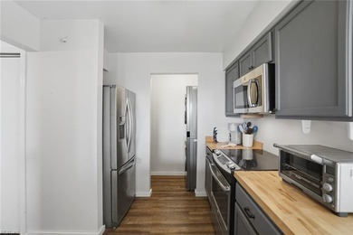 Beachfront living awaits in this fully furnished 2-bedroom - photo 11