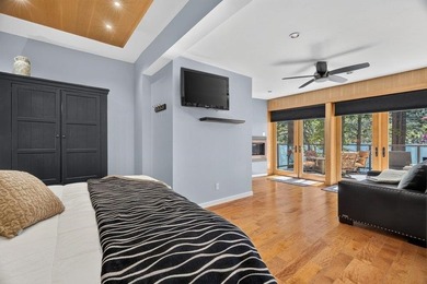 Perched just steps from the shoreline, this extensively - photo 14