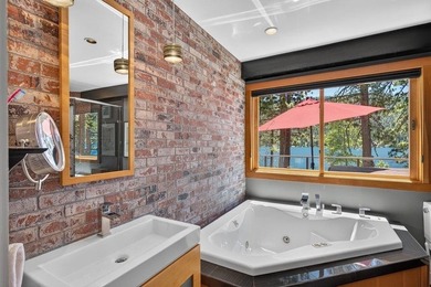 Perched just steps from the shoreline, this extensively - photo 15