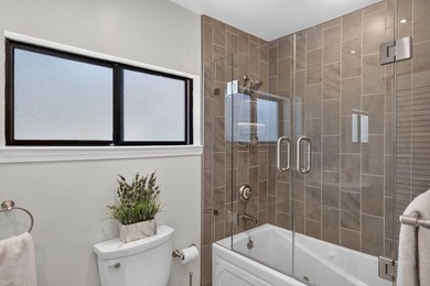 Perched just steps from the shoreline, this extensively - photo 19