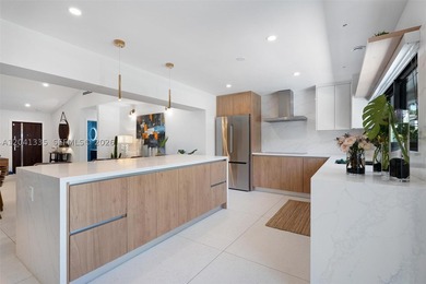 Introducing this exquisite 3-bedroom, 3-bath Miami Shores - photo 12