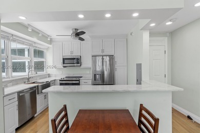 Fully renovated and thoughtfully reimagined, this east-facing - photo 6