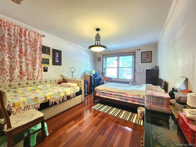 Welcome to unit 1K at 143-07 Sanford Avenue, a well-maintained - photo 7