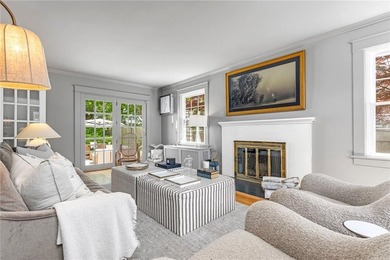 A gracious residence tucked along a picturesque street just off - photo 5